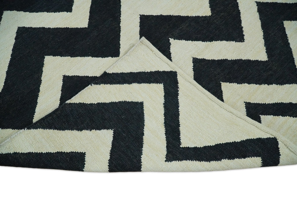 Black and Beige Chevron Design Hand Woven Dhurrie Rug.