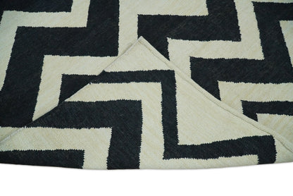 Black and Beige Chevron Design Hand Woven Dhurrie Rug.