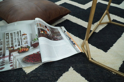 Black and Beige Chevron Design Hand Woven Dhurrie Rug.