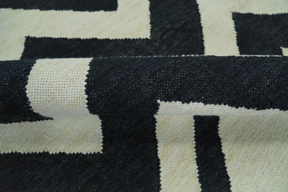 Black and Beige Chevron Design Hand Woven Dhurrie Rug.