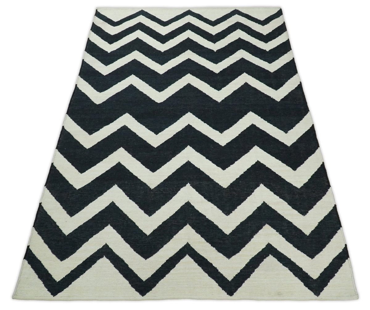 Black and Beige Chevron Design Hand Woven Dhurrie Rug.