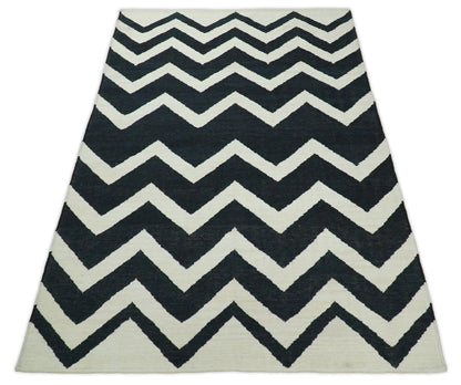Black and Beige Chevron Design Hand Woven Dhurrie Rug.