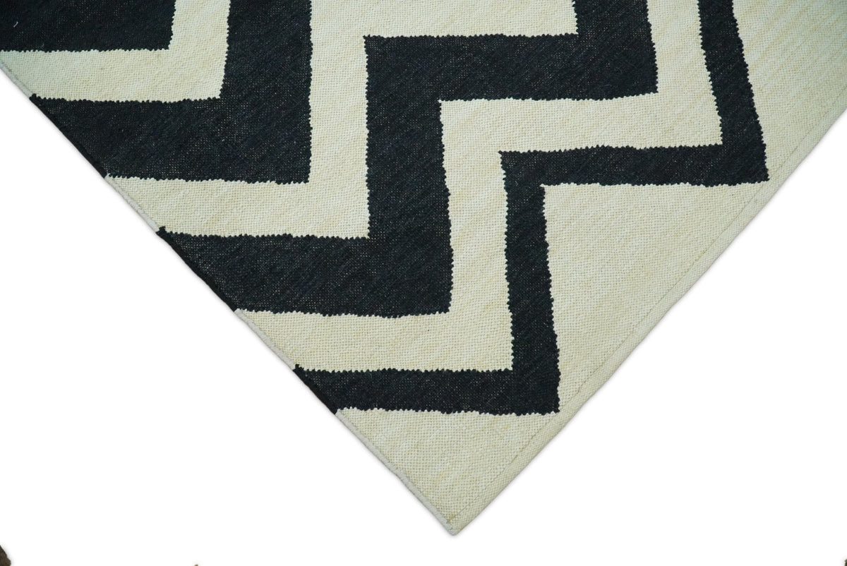 Black and Beige Chevron Design Hand Woven Dhurrie Rug.