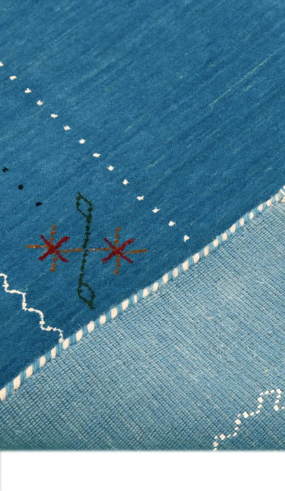 Blue And White Gabbeh Border Design Hand Loomed Wool Area Rug.