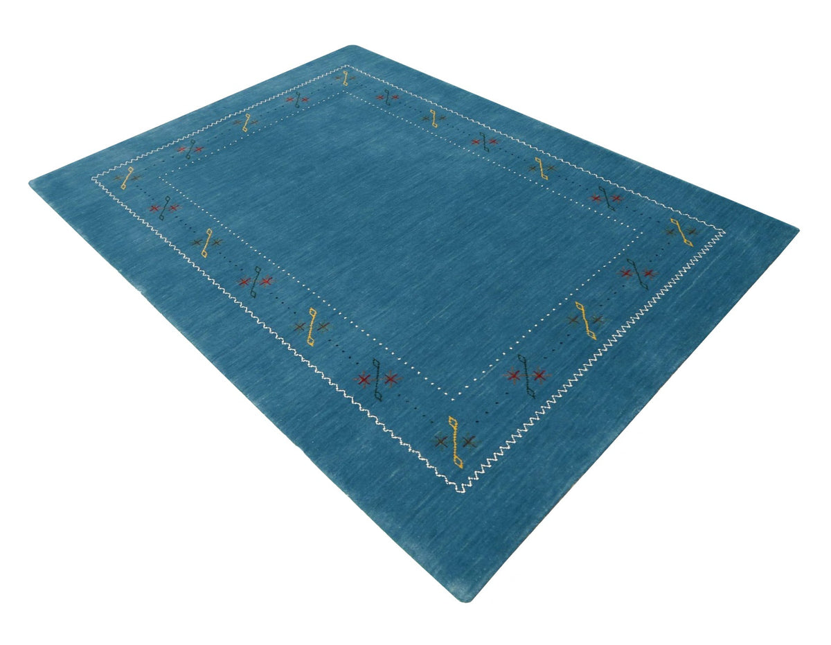 Blue And White Gabbeh Border Design Hand Loomed Wool Area Rug.