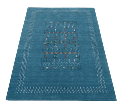 Blue And White Gabbeh Design Hand Loomed Wool Area Rug.