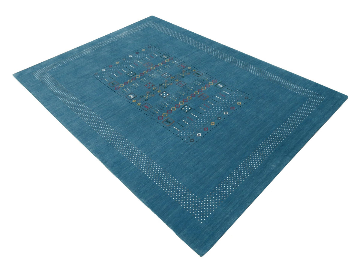 Blue And White Gabbeh Design Hand Loomed Wool Area Rug.