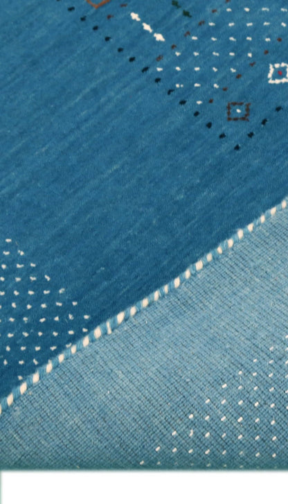 Blue And White Gabbeh Design Hand Loomed Wool Area Rug.