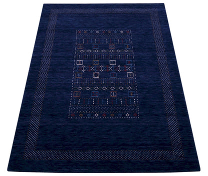Blue Center Pattern Hand Loomed Wool Area Rug.