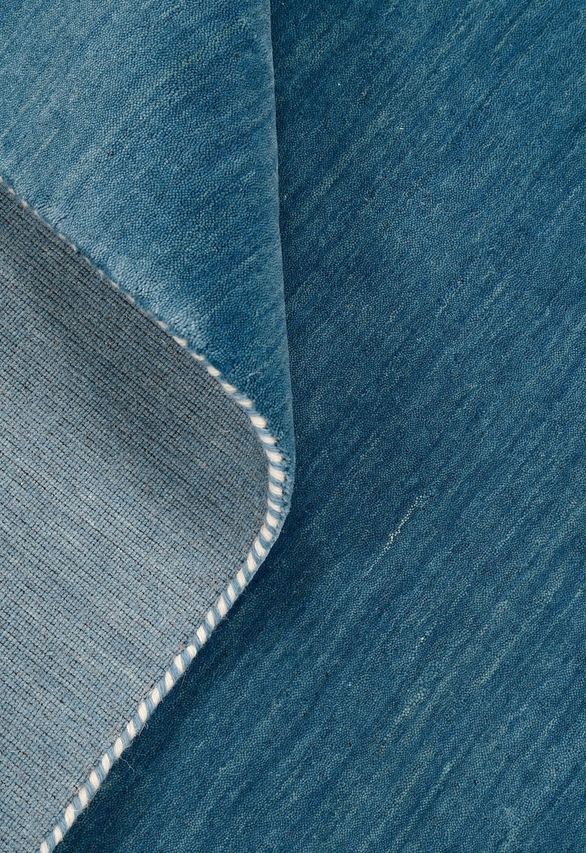 Blue Modern Solid Design Hand Loomed Wool Area Rug.