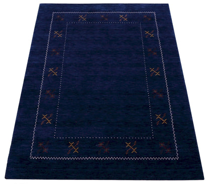 Blue Tribal Border Design Hand Loomed Wool Area Rug.