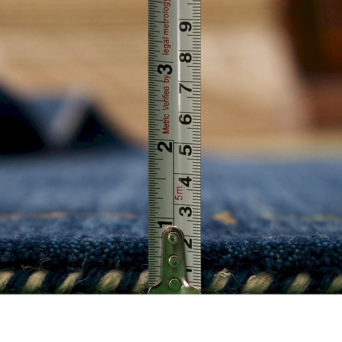 Blue Tribal Border Design Hand Loomed Wool Area Rug.