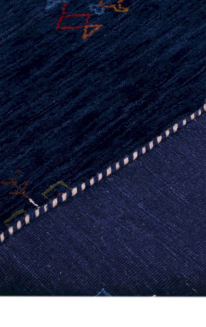 Blue Tribal Center Medallion Hand Loomed Wool Area Rug.