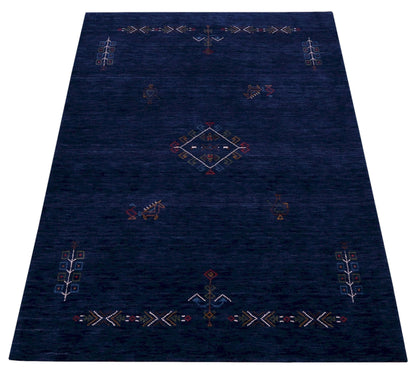 Blue Tribal Center Medallion Hand Loomed Wool Area Rug.