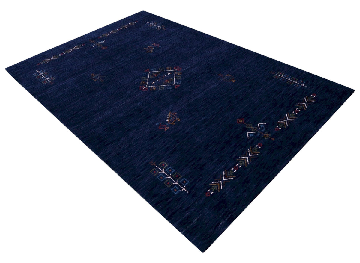 Blue Tribal Center Medallion Hand Loomed Wool Area Rug.