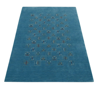 Blue Tribal Design Hand Loomed Wool Area Rug.