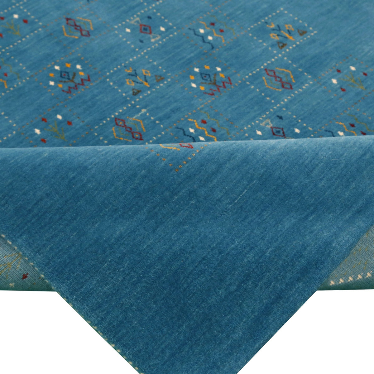 Blue Tribal Design Hand Loomed Wool Area Rug.