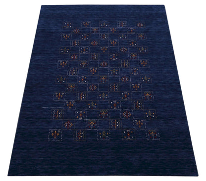 Blue Tribal Design Hand Loomed Wool Area Rug.