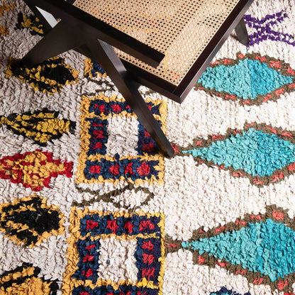 Benisouk boucherouite rug OuedLaou - vintage boucherouite rug 6x8.9 ft | 141x272 cm OuedLaou - vintage boucherouite rug 6x8.9 ft | 141x272 cm