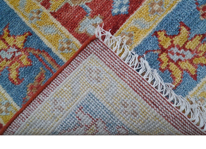 Brickle Red And Blue Traditional Hand Knotted Wool Area Rug.