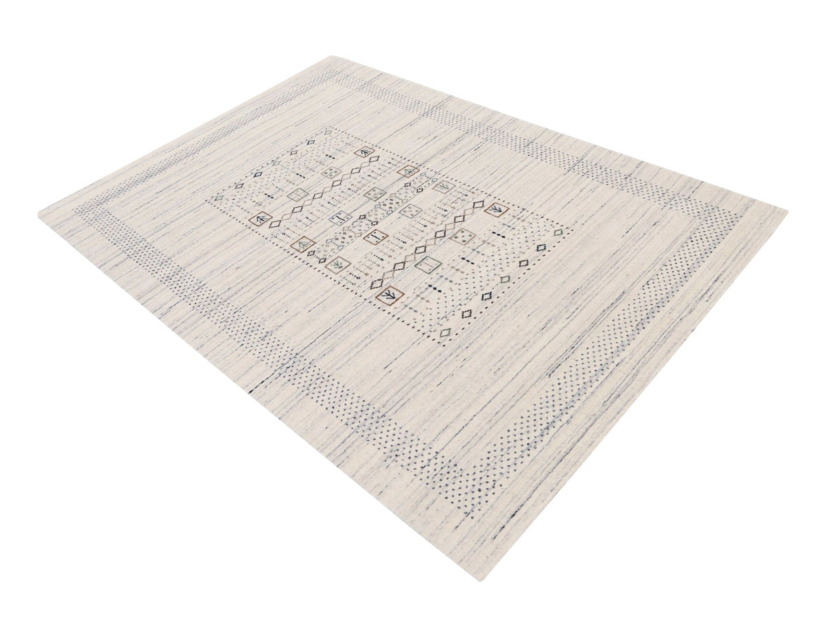 Center Pattern Natural Hand Loomed Wool Area Rug.