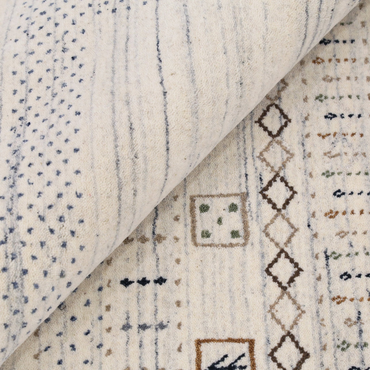 Center Pattern Natural Hand Loomed Wool Area Rug.