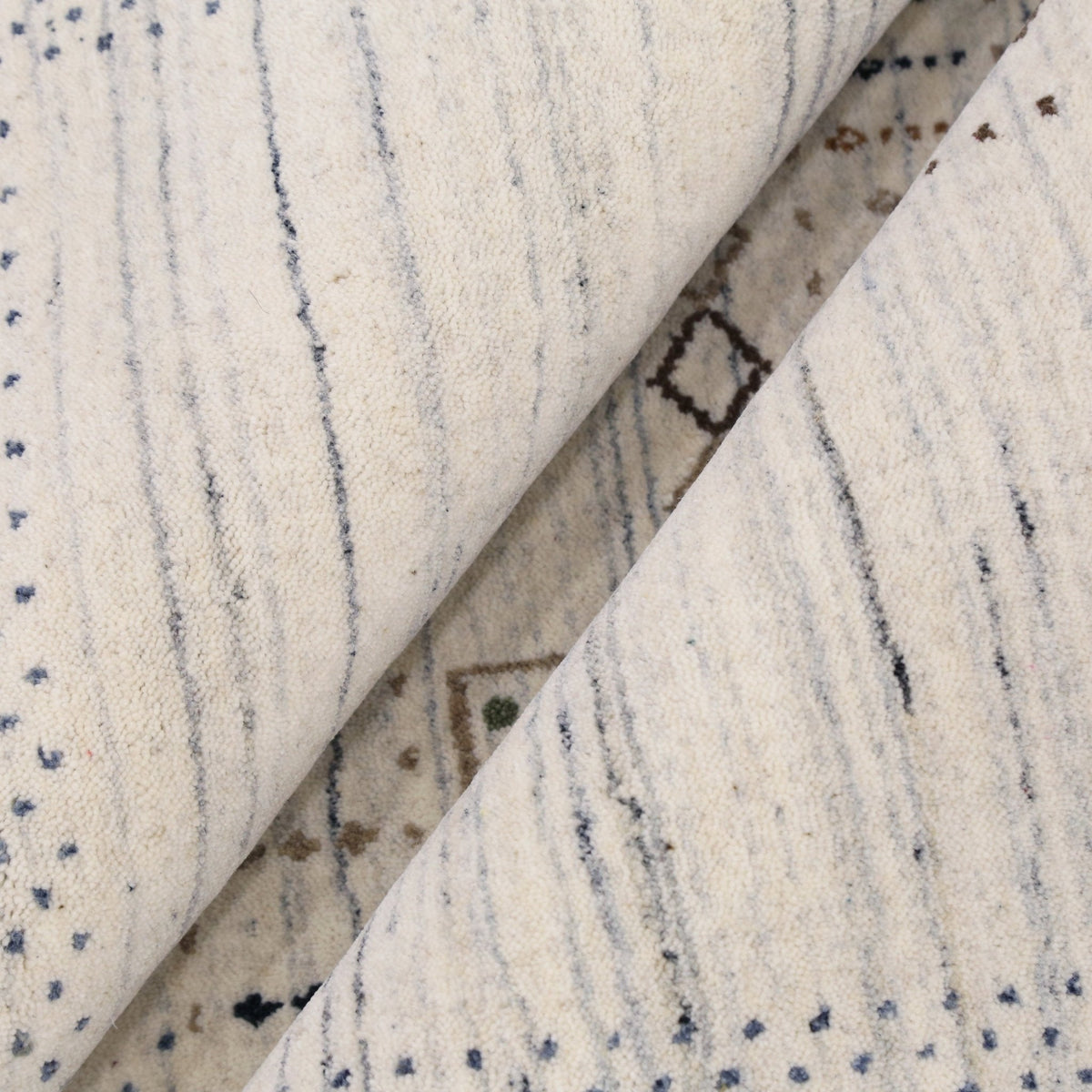 Center Pattern Natural Hand Loomed Wool Area Rug.