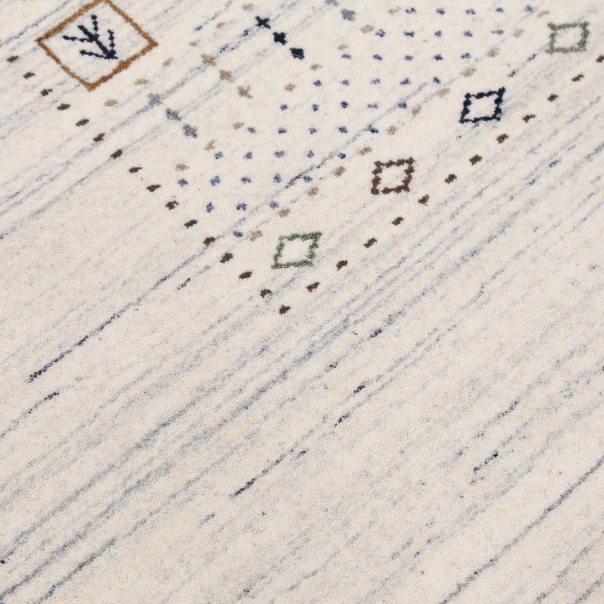 Center Pattern Natural Hand Loomed Wool Area Rug.