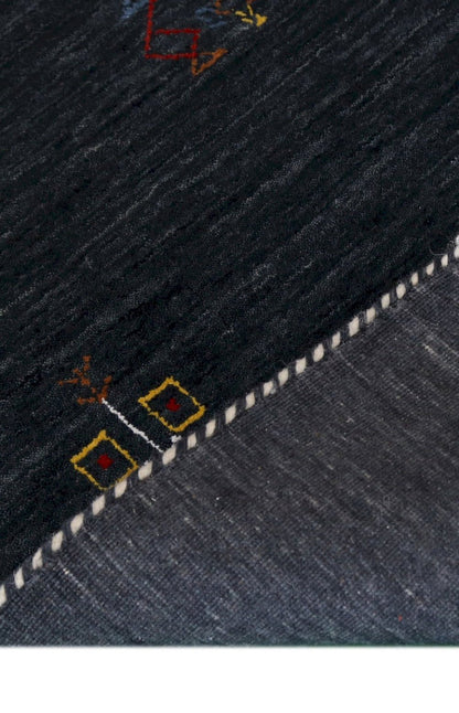 Charcoal Tribal Center Medallion Hand Loomed Wool Area Rug.