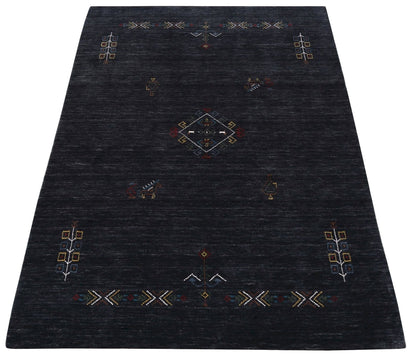 Charcoal Tribal Center Medallion Hand Loomed Wool Area Rug.