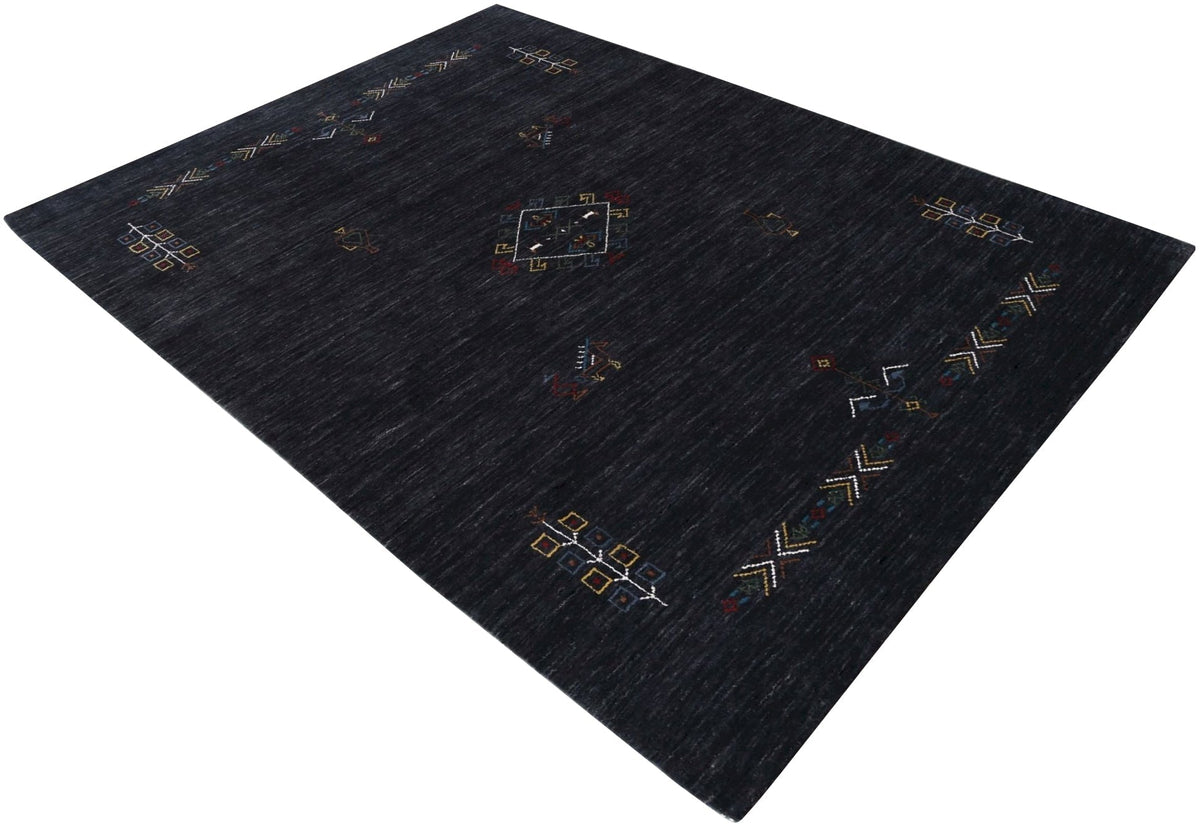 Charcoal Tribal Center Medallion Hand Loomed Wool Area Rug.