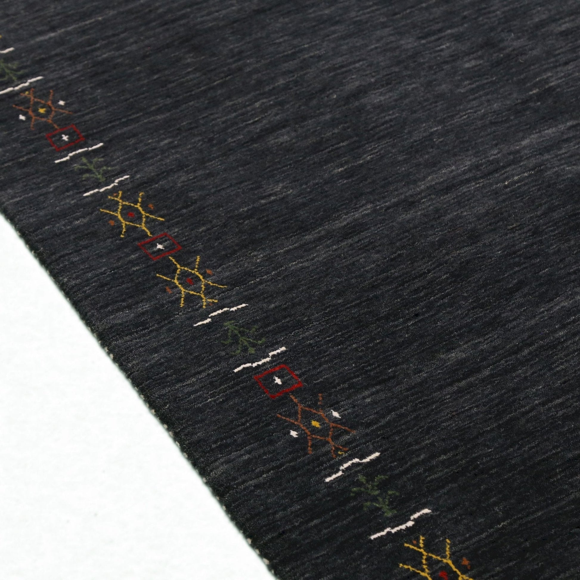 Charcoal Tribal Design Border Hand Loomed Wool Area Rug.