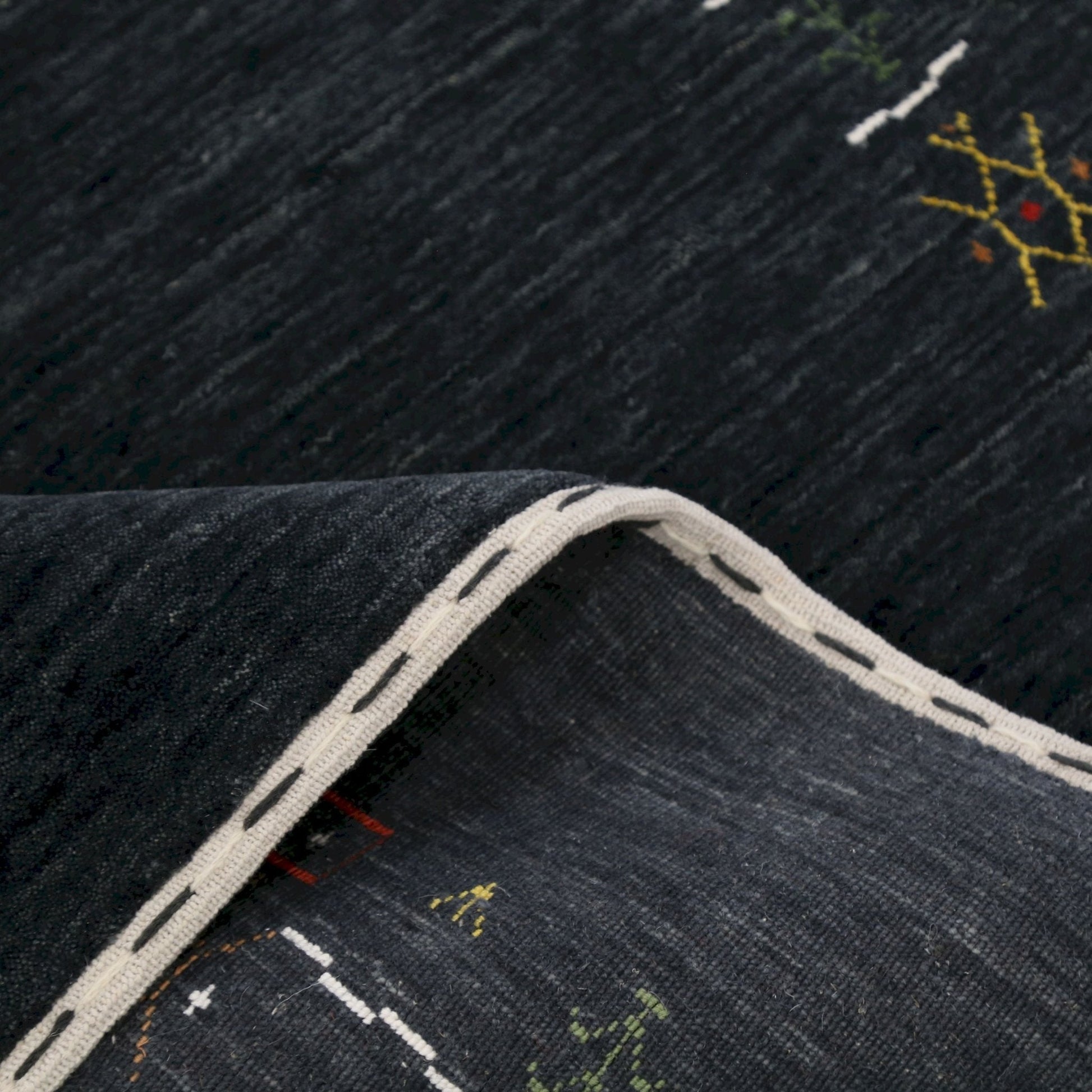 Charcoal Tribal Design Border Hand Loomed Wool Area Rug.