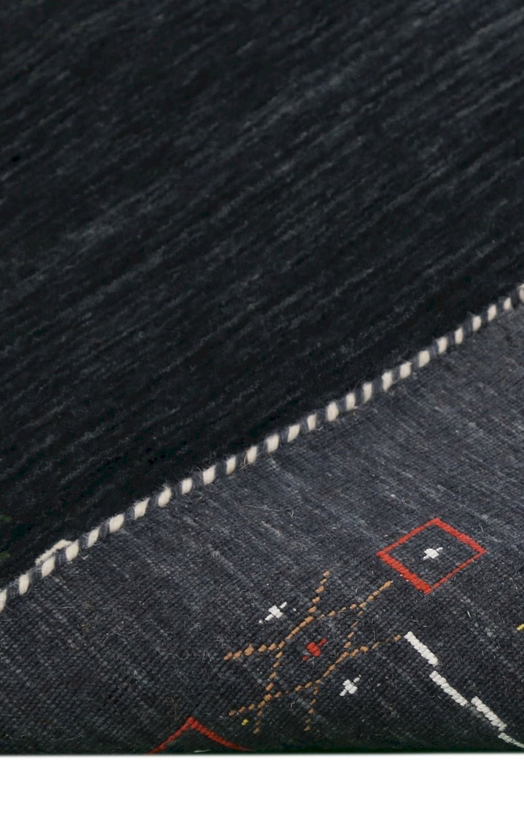 Charcoal Tribal Design Border Hand Loomed Wool Area Rug.