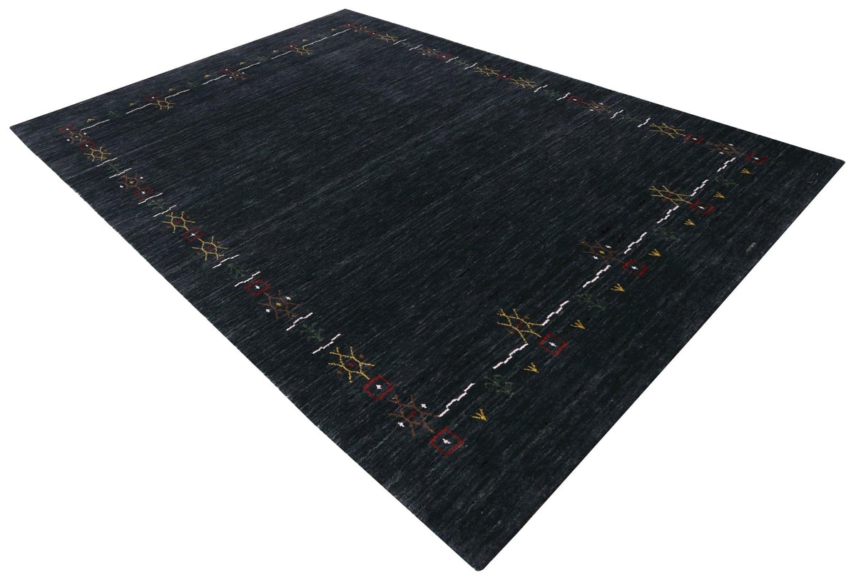 Charcoal Tribal Design Border Hand Loomed Wool Area Rug.