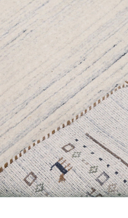 Contemporary Ivory Design Hand Loomed Wool Rug.