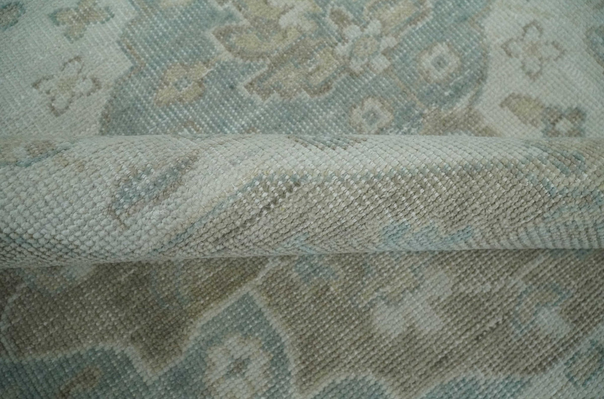 Custom Made Antique Style Neutral Ivory and Camel Custom Made wool Area Rug.