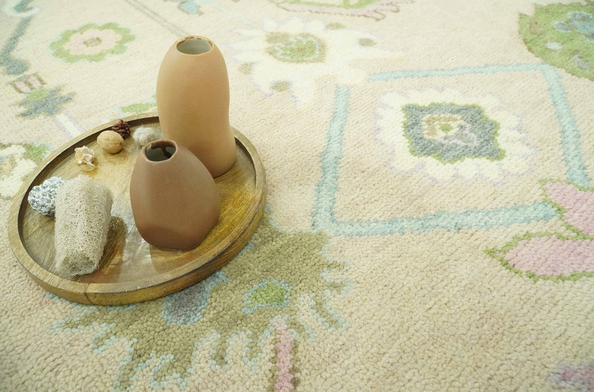 Custom Made Beige and Green Hand Knotted Traditional Oriental Oushak wool area rug.