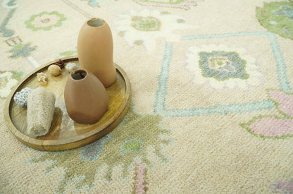 Custom Made Beige and Green Hand Knotted Traditional Oriental Oushak wool area rug.