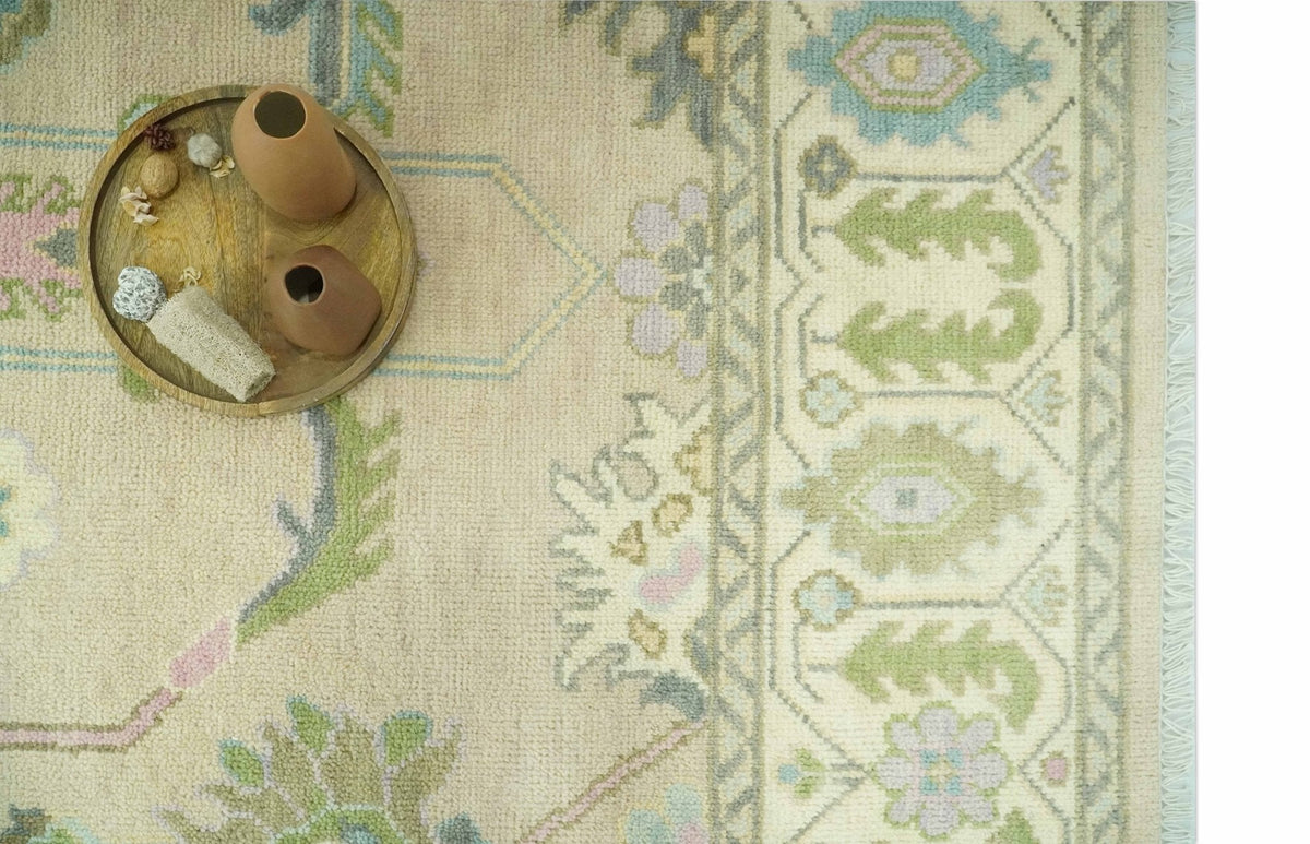 Custom Made Beige and Green Hand Knotted Traditional Oriental Oushak wool area rug.
