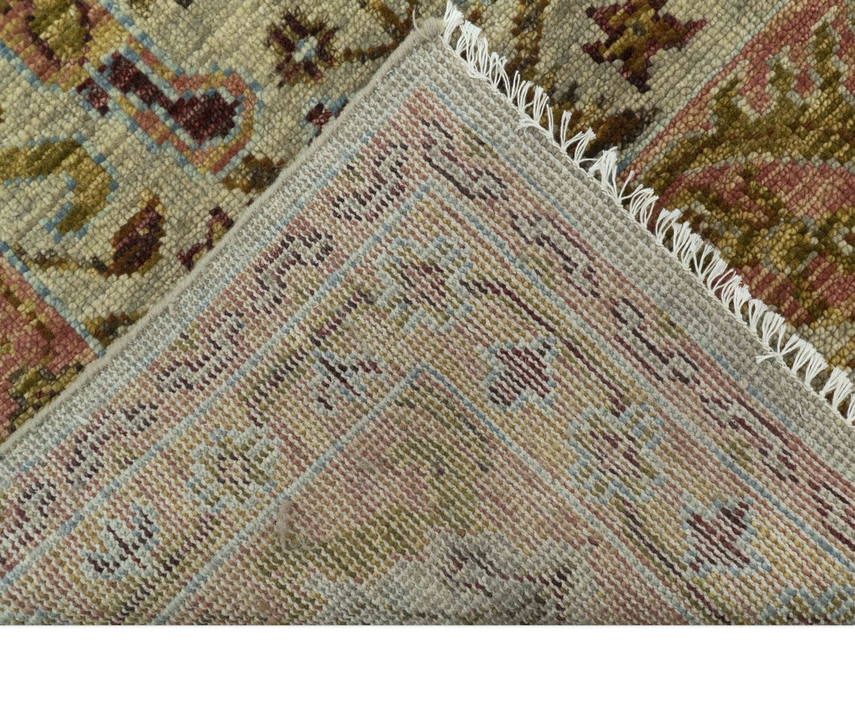 Custom Made Beige, Peach And Green Transition Hand Knotted wool rug.
