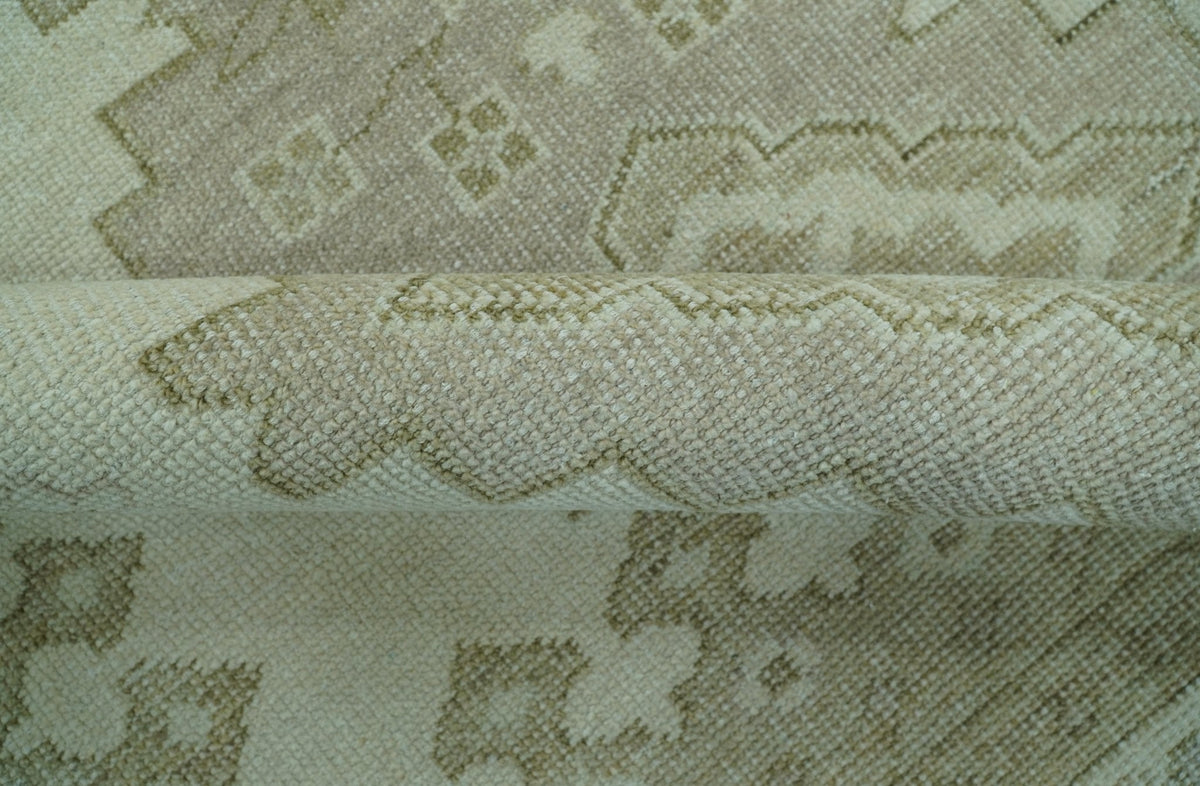 Custom Made Beige Traditional Turkish Design Hand knotted Wool Area Rug.