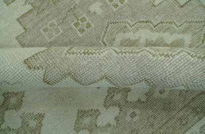 Custom Made Beige Traditional Turkish Design Hand knotted Wool Area Rug.