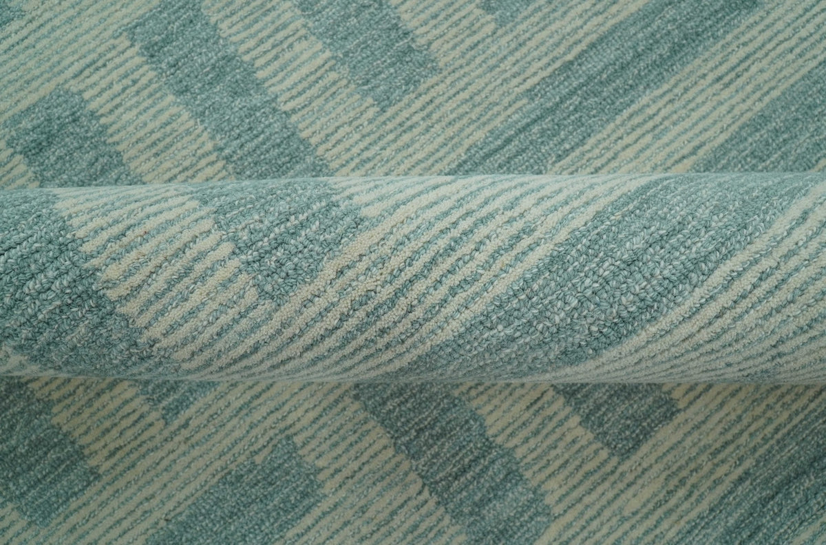 Custom Made Blue And Ivory Modern Abstract Pattern Hand Tufted Wool Area Rug.