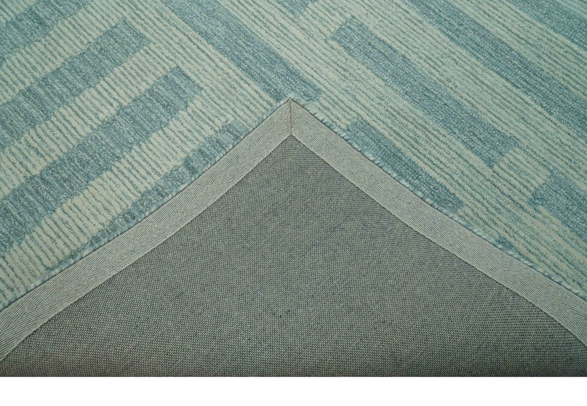 Custom Made Blue And Ivory Modern Abstract Pattern Hand Tufted Wool Area Rug.