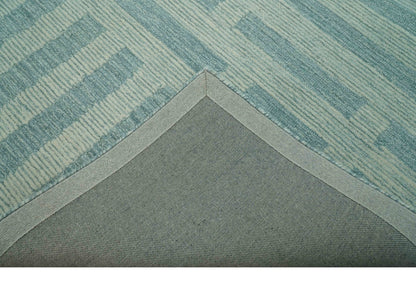Custom Made Blue And Ivory Modern Abstract Pattern Hand Tufted Wool Area Rug.