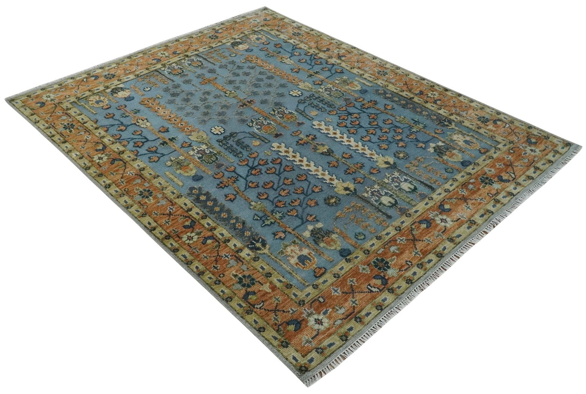 Custom Made Hand Knotted Blue and Rust Tree Design Low pile Wool Area Rug.