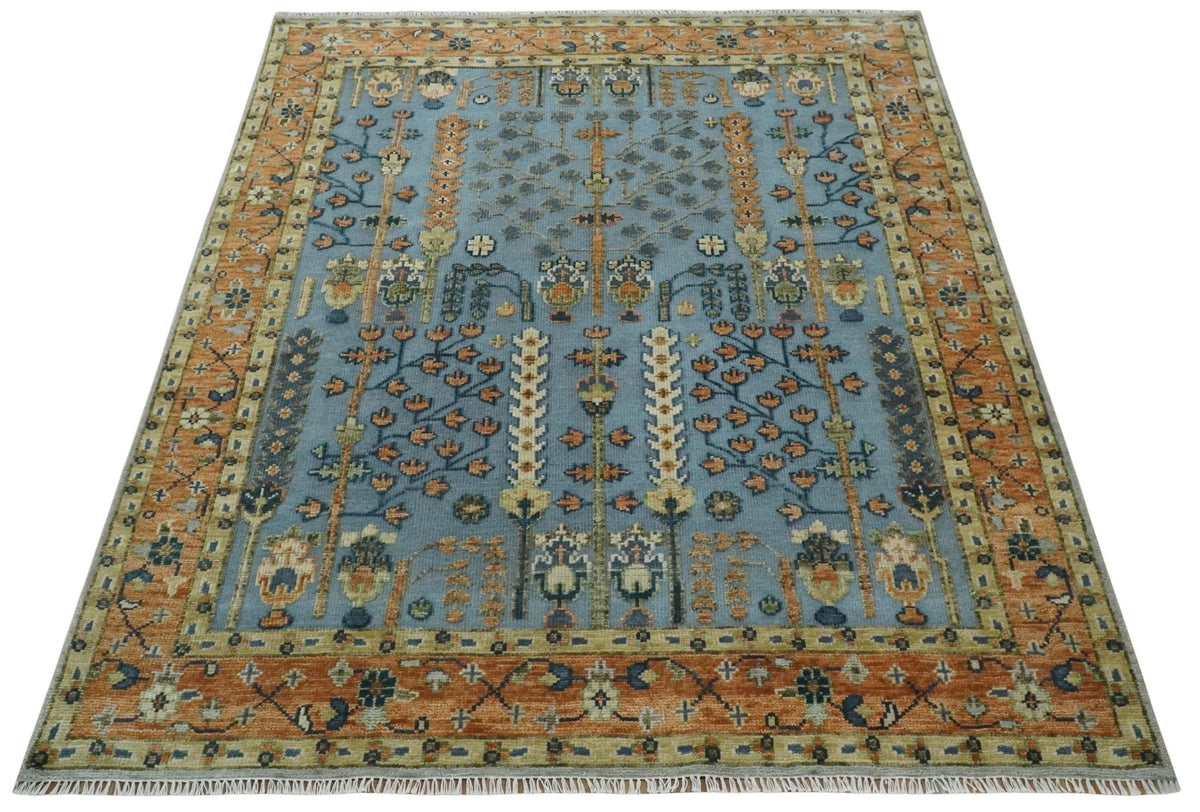Custom Made Hand Knotted Blue and Rust Tree Design Low pile Wool Area Rug.