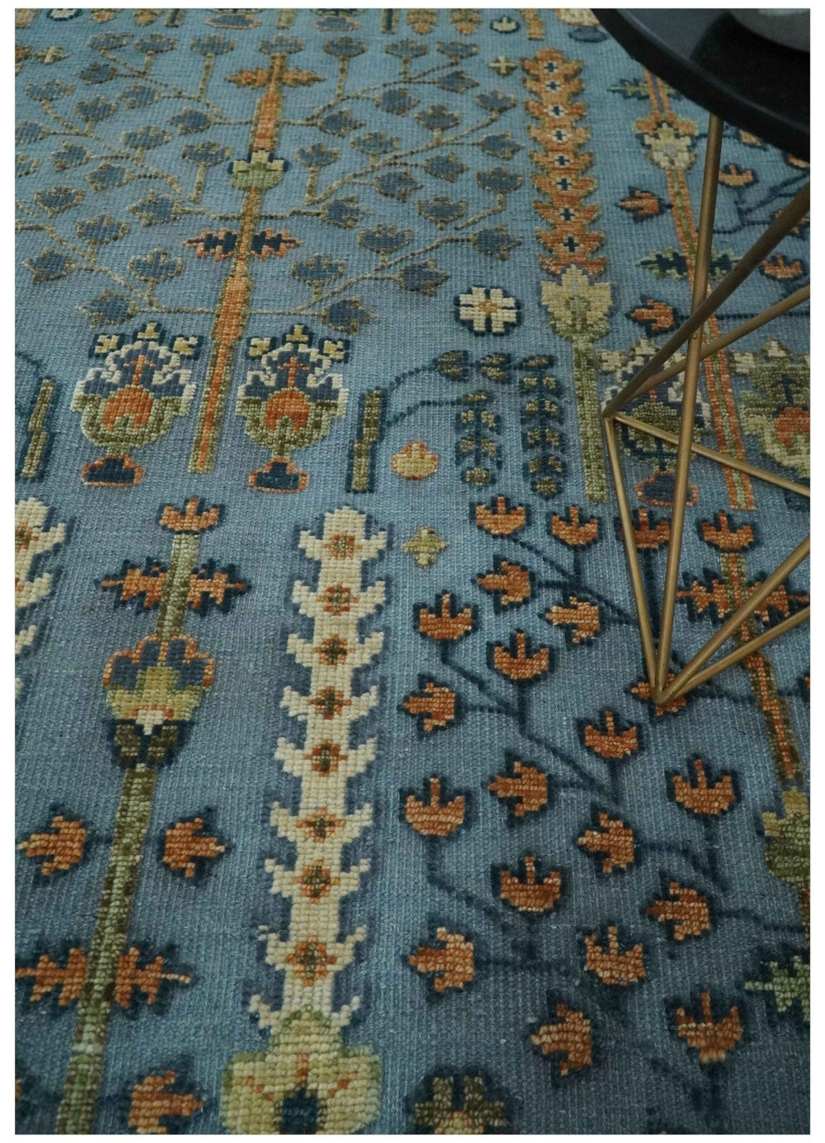 Custom Made Hand Knotted Blue and Rust Tree Design Low pile Wool Area Rug.
