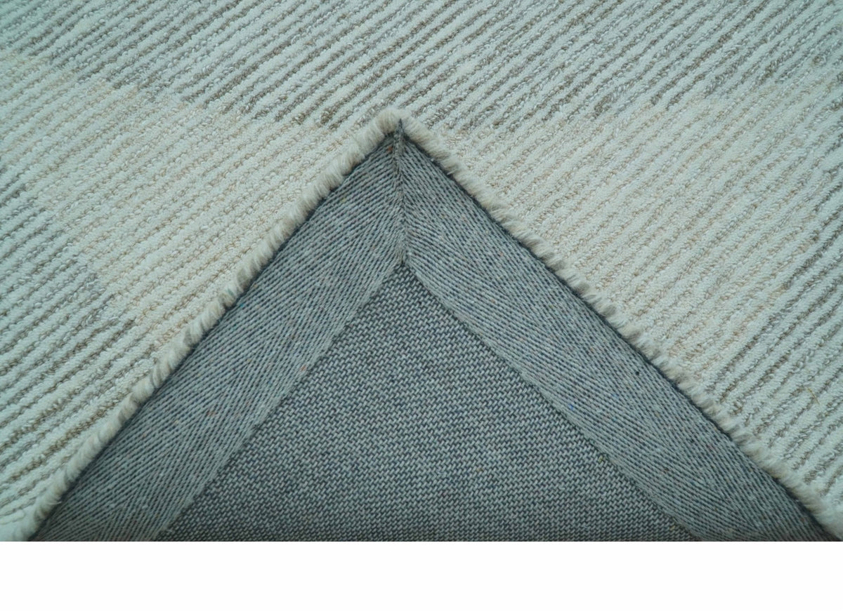 Custom Made Ivory, Gray and Beige Modern Contemporary Hand Tufted wool rug.